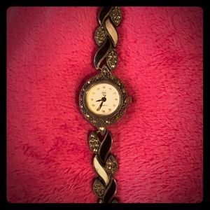 Black, rhinestone, and pearl plated Quartz watch